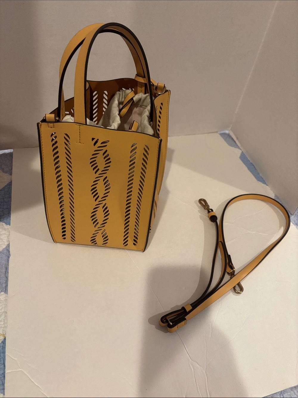 Charles & Keith  
Yellow Laser-Cut Tote with Removable Strap